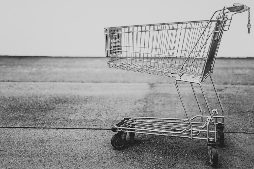 Laptop with digital shield symbol representing cybersecurity and data protection